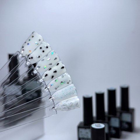 NAILSOFTHEDAY Party top 06 - przezroczysty top z holograficznymi choinkami, bez lepkiej warstwy, 10 ml. NAILSOFTHEDAY Party top 06 - przezroczysty top z holograficznymi choinkami, bez lepkiej warstwy, 10 ml.